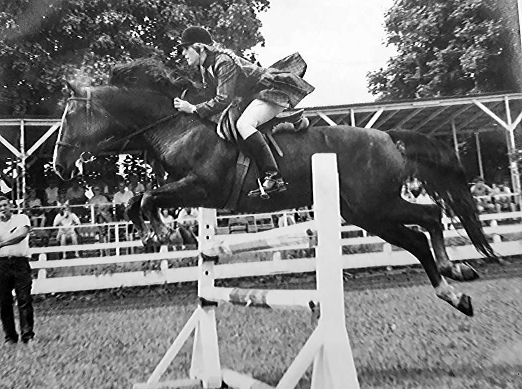 Louise Henry on the original Johnny Appleseed Morgan horse